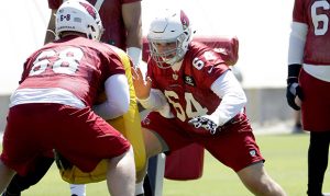 Not according to plan: Cardinals' injury-battered O-line holding up