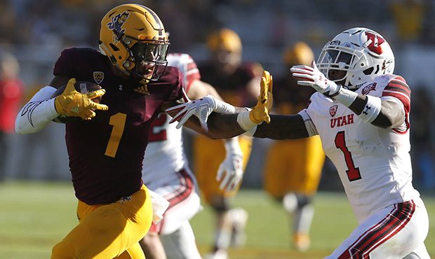 Arizona State wide receiver N'Keal Harry (1) fends off Utah defensive back Jaylon Johnson in the se...