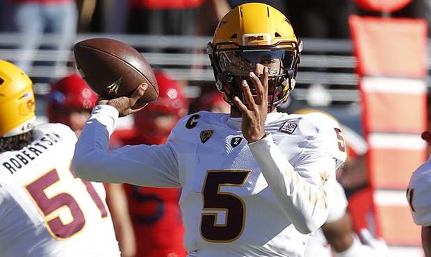 Arizona State quarterback Manny Wilkins (5) throws downfield against Arizona in the first half duri...