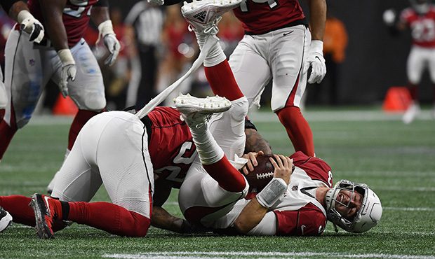 Arizona Cardinals quarterback Josh Rosen (3) is sacked by Atlanta Falcons defensive end Bruce Irvin...
