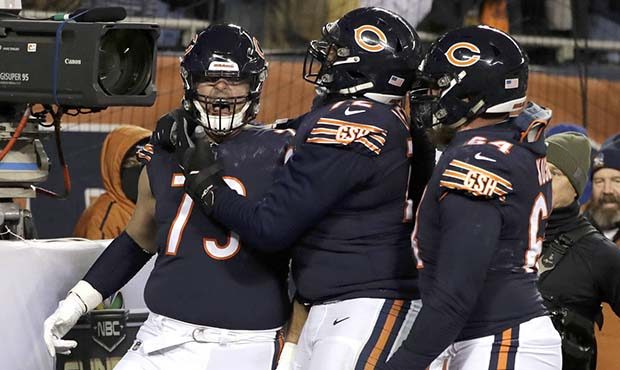 Chicago Bears offensive tackle Bradley Sowell (79) celebrates a touchdown reception with teammates ...
