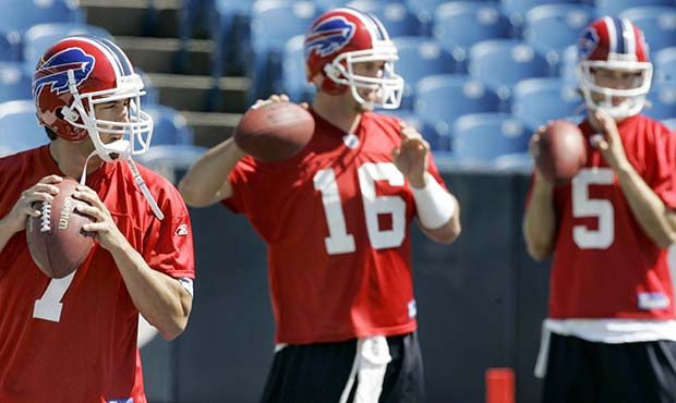 Buffalo Bills quarterback J. P. Losman (7) drops back to pass in front of quarterbacks Craig Nall (...