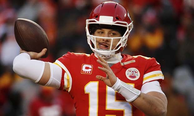 Kansas City Chiefs quarterback Patrick Mahomes warms up before the AFC Championship NFL football ga...