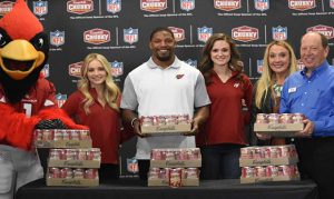 Cardinals' Johnson donates 22,000 cans of soup to St. Mary's Food Bank