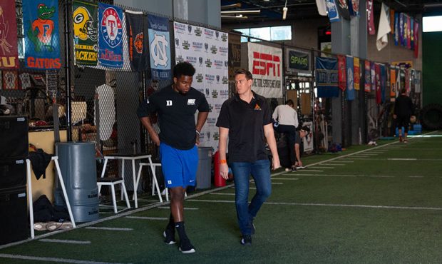Duke Blue Devils linebacker Joe Giles-Harris and JAWKU wristband creator John Wells work together a...
