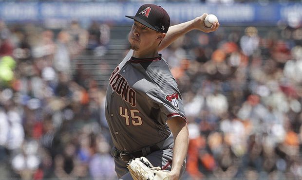 Taylor Clarke  #45 of the Arizona Diamondbacks pitches against the Chicago Cubs during the ninth in...