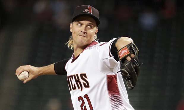 Arizona Diamondbacks starting pitcher Zack Greinke throws against the Pittsburgh Pirates during the...