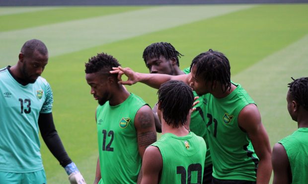 Junior Flemmings (12) and Kevon Lambert (21) could be featured in Tuesday’s Group C decider again...