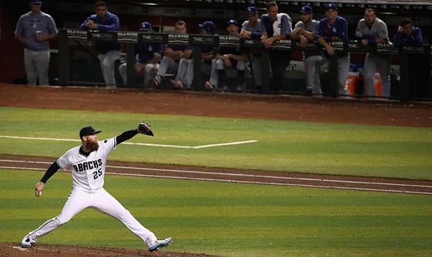 Relief pitcher Archie Bradley #25 of the Arizona Diamondbacks pitches against the Los Angeles Dodge...