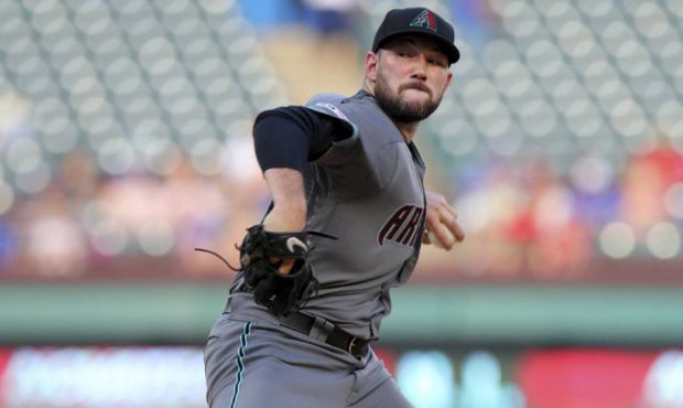 Arizona Diamondbacks starting pitcher Alex Young (49) delivers against the Texas Rangers in the fir...