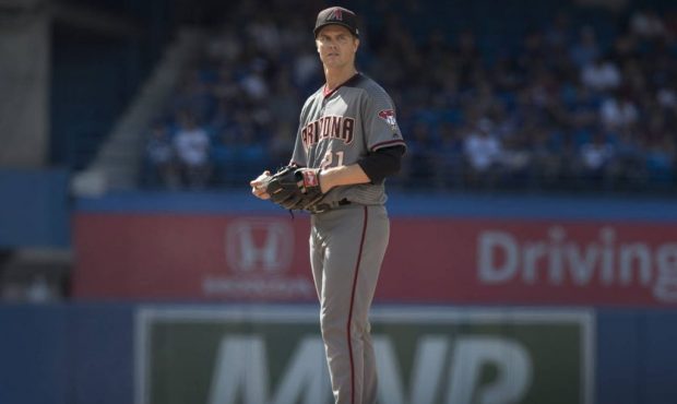 Arizona Diamondbacks starting pitcher Zack Greinke takes a pause on the mound in the sixth inning o...