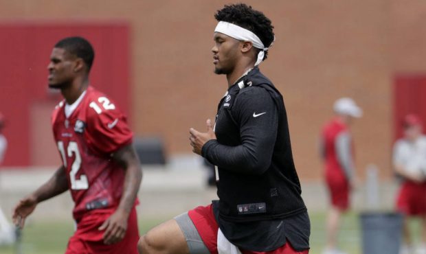 Arizona Cardinals' quarterback Kyler Murray works out during an NFL football rookies camp, Friday, ...