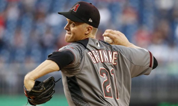Arizona Diamondbacks starting pitcher Zack Greinke throws to a Washington Nationals batter during t...