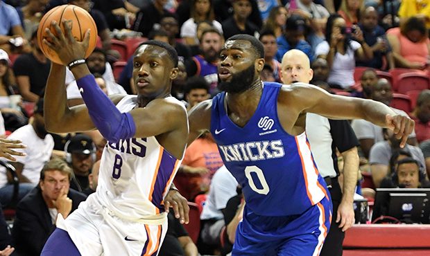 Jared Harper #8 of the Phoenix Suns drives against Kadeem Allen #0 of the New York Knicks during th...