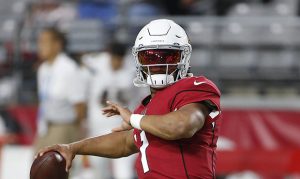 Kyler Murray rocks Devin Booker's shoes, red visor pregame