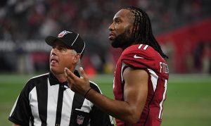 Cardinals, officials still talking out fake hand-clap snaps