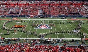 Arizona to wear uniforms honoring USS Arizona, Dick Tomey in opener