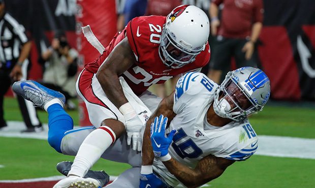 GLENDALE, AZ - SEPTEMBER 08:  Arizona Cardinals defensive back Tramaine Brock (20) breaks up a pass...