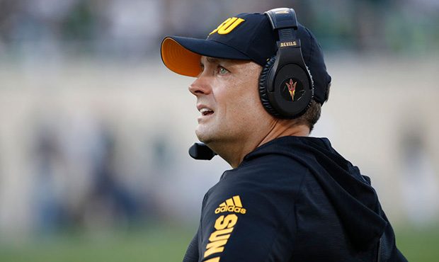 Defensive coordinator Danny Gonzales of the Arizona State Sun Devils looks on during the game again...