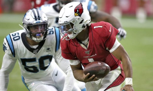 Arizona Cardinals quarterback Kyler Murray (1) is sacked by Carolina Panthers linebacker Christian ...