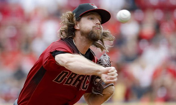 Arizona Diamondbacks starting pitcher Mike Leake throws in the second inning of a baseball game aga...