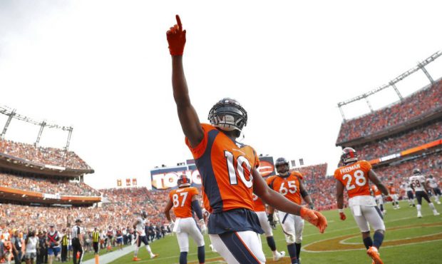 Denver Broncos wide receiver Emmanuel Sanders (10) celebrates his touchdown against the Chicago Bea...