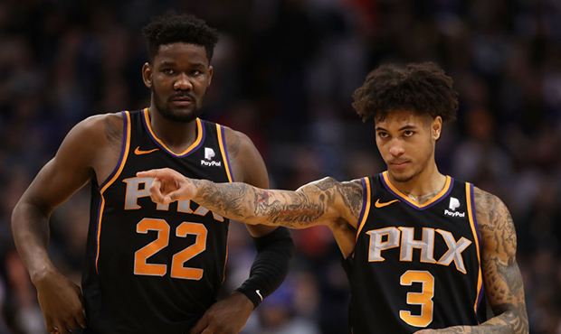 Deandre Ayton #22 and Kelly Oubre Jr. #3 of the Phoenix Suns during the second half of the NBA game...