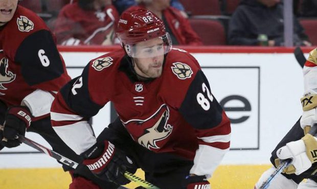 Arizona Coyotes defenseman Jordan Oesterle (82) and Vegas Golden Knights center Brandon Pirri (73) ...