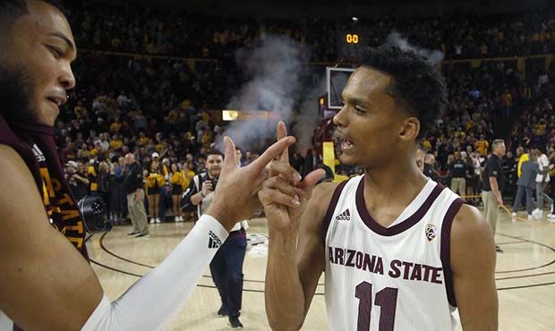 Arizona State guard Alonzo Verge Jr. (11) celebrates a win against Arizona with Arizona State's And...