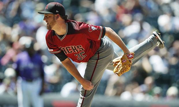 Arizona Diamondbacks relief pitcher Matt Andriese works against the Colorado Rockies in the third i...