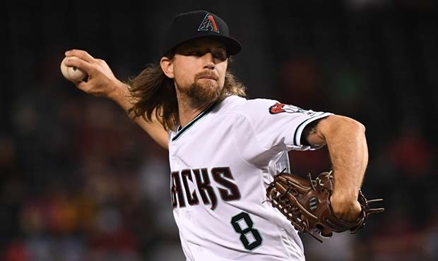 Mike Leake #8 of the Arizona Diamondbacks delivers a first inning pitch against the St Louis Cardin...