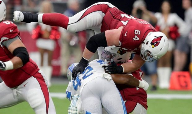 Arizona Cardinals quarterback Kyler Murray is sacked by Detroit Lions outside linebacker Devon Kenn...