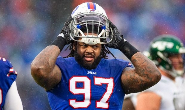 Jordan Phillips #97 of the Buffalo Bills puts on his helmet during the second quarter against the N...