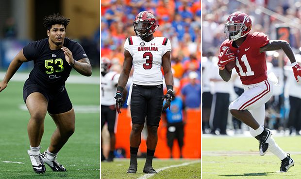 L-R: Iowa OL Tristan Wirfs (Photo by Joe Robbins/Getty Images); South Carolina DL Javon Kinlaw (Pho...