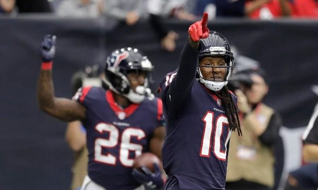 Houston Texans wide receiver DeAndre Hopkins (10) celebrates a touchdown catch by teammate Lamar Mi...