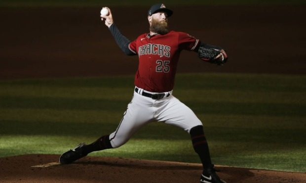 Arizona Diamondbacks pitcher Archie Bradley throws during an intrasquad baseball game at Chase Fiel...