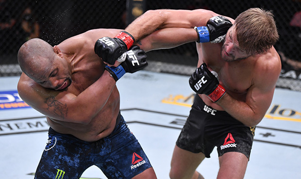 LAS VEGAS, NEVADA - AUGUST 15: (R-L) Stipe Miocic punches Daniel Cormier in their UFC heavyweight c...