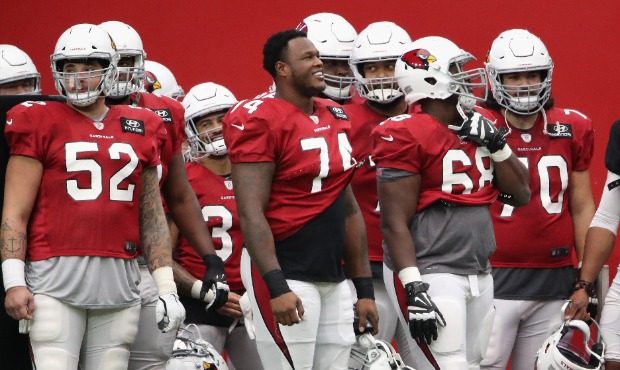 AUGUST 28: Offensive tackle D.J. Humphries #74 of the Arizona Cardinals stands with teammates durin...