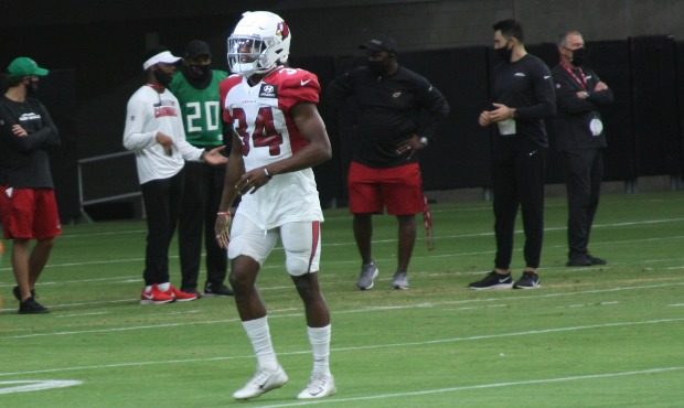 Second-year Arizona Cardinals safety Jalen Thompson warms up at State Farm Stadium on Monday, Aug. ...