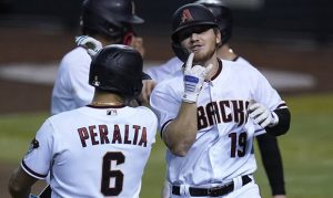 Arizona scores 11 runs in 7-inning, Little League-like win over Rockies