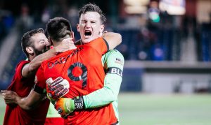 Lubin makes up for howler, Rising FC advances to West Final on penalties