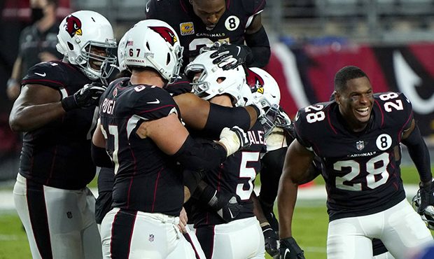 Arizona Cardinals kicker Zane Gonzalez (5) celebrates his game-winning field goal with teammates af...
