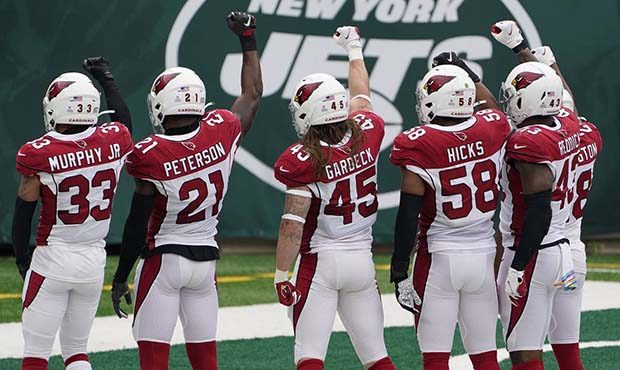 Arizona Cardinals linebacker Dennis Gardeck (45) and his defensive teammates celebrate after sackin...