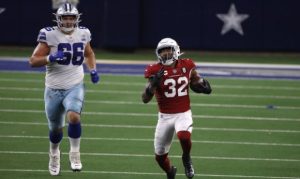 Budda Baker gets 1st NFL interception, celebrates by bowling