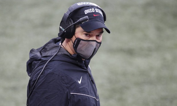 Ohio State head coach Ryan Day talks to his players during an NCAA college football game against In...