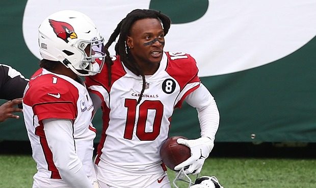DeAndre Hopkins #10 of the Arizona Cardinals celebrates his fourth quarter touchdown with Kyler Mur...