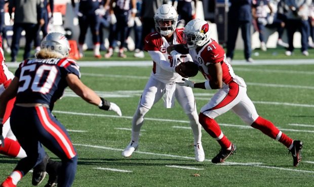 Arizona Cardinals quarterback Kyler Murray (1) hands off to Arizona Cardinals running back Kenyan D...