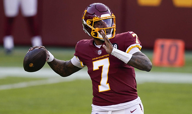 Washington Football Team quarterback Dwayne Haskins (7) passes the ball during the first half of an...