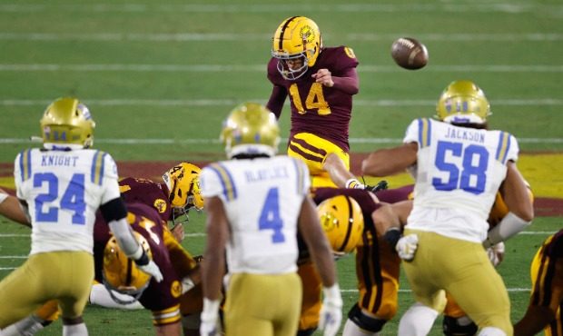Place kicker Jack Luckhurst #14 of the Arizona State Sun Devils kicks a 49-yard field goal against ...
