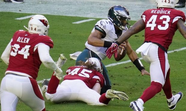 Arizona Cardinals linebacker Dennis Gardeck (45) sacks Philadelphia Eagles quarterback Jalen Hurts ...